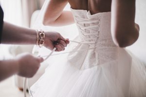 Tying up wedding dress